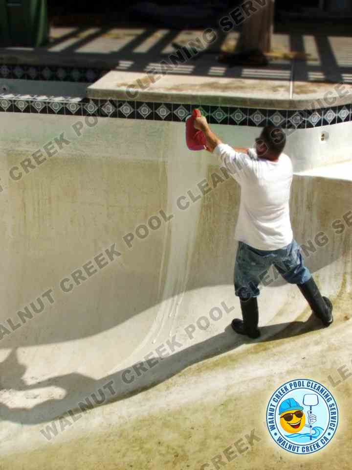 Acid washing a swimming pool in Walnut Creek, before starting a restart