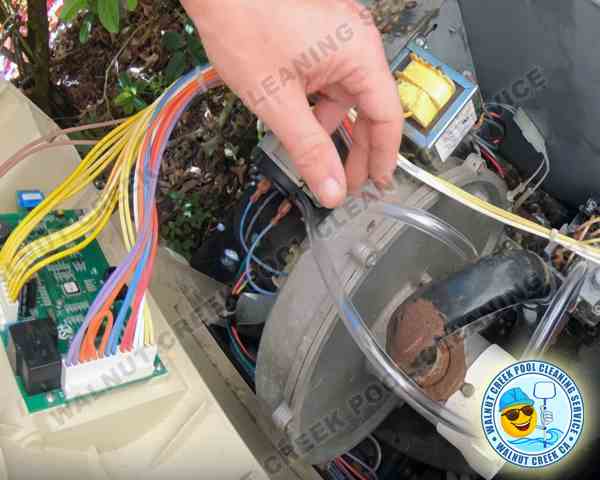 While performing weekly pool maintenance, I diagnose a pool heating assembly at a customer's home in Walnut Creek.