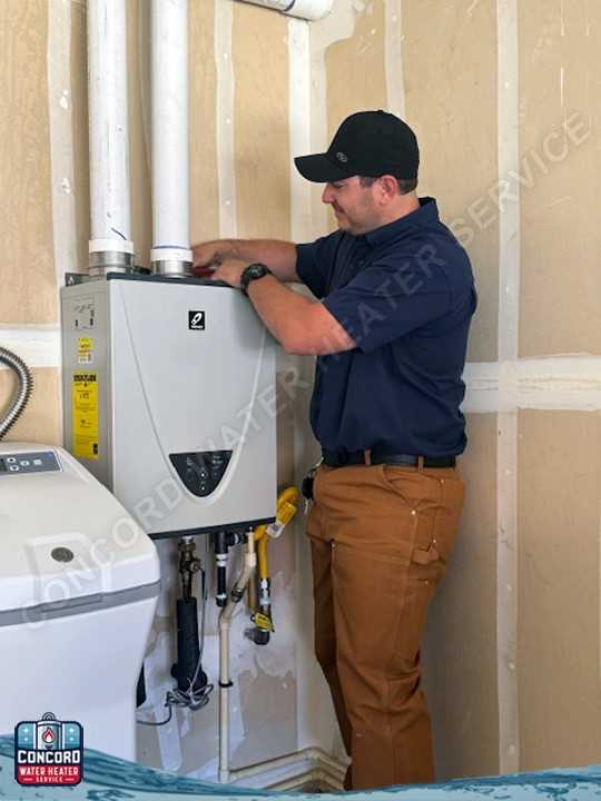 Professional technician installing water heater system in Concord CA