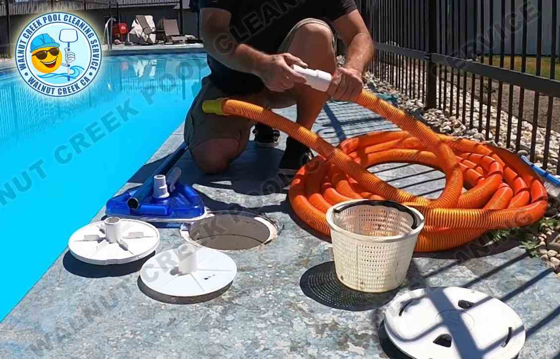 Cleaning the pool filter while performing weekly pool maintenance at a customer's home in Walnut Creek.